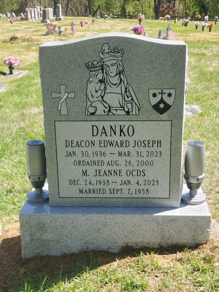 double monument with prominent religious symbol