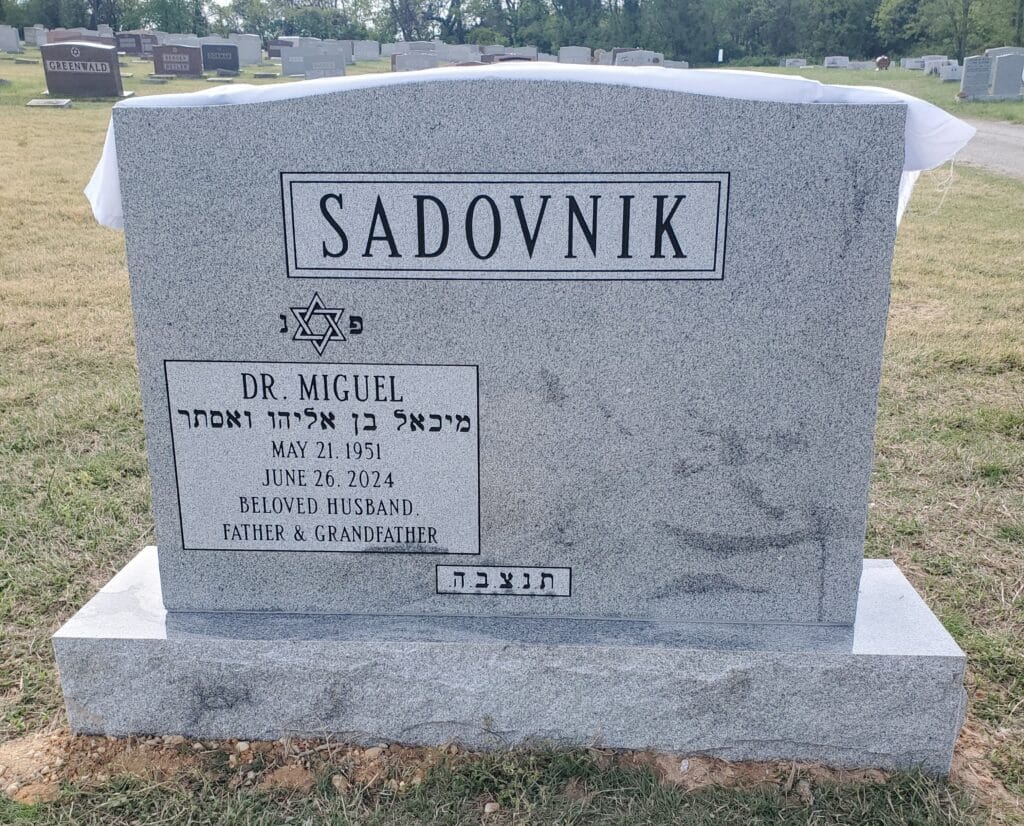 Companion granite headstone featuring Star of David