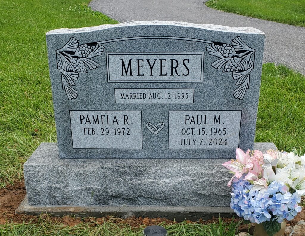Two-name upright memorial with detailed custom engraving