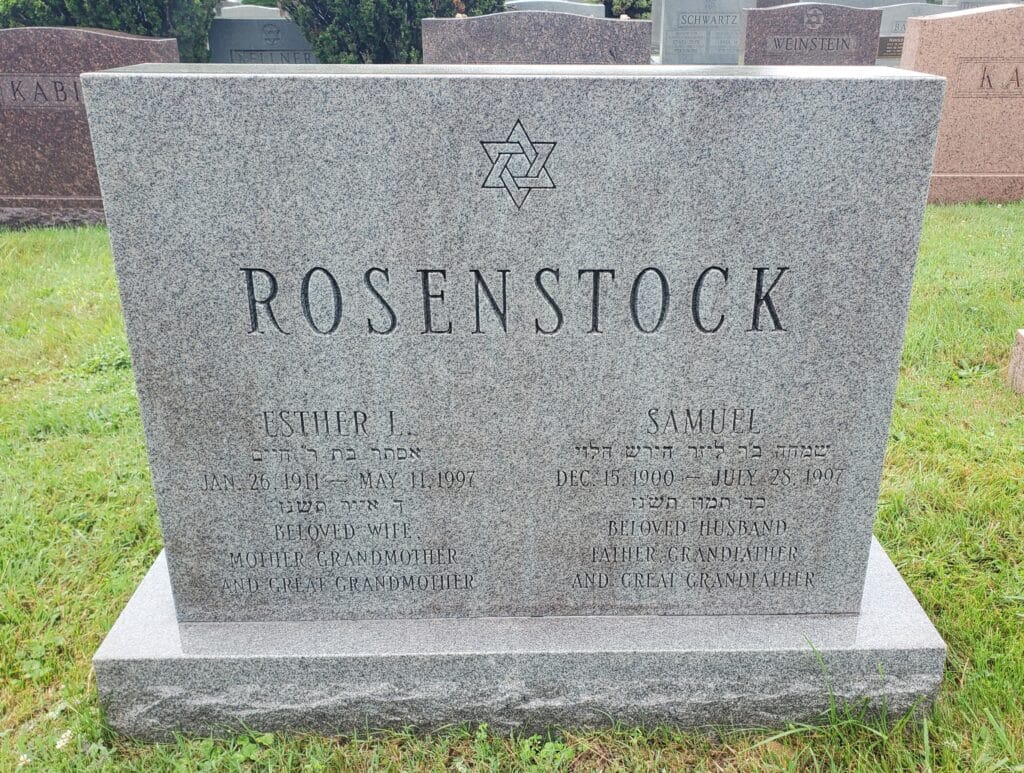 Companion upright monument with deep-cut lettering and smooth finish