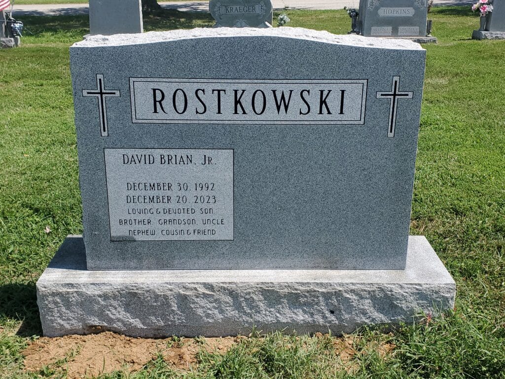 family companion monument with Latin crosses