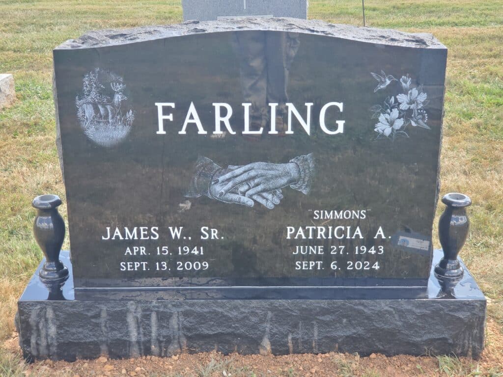 black granite double monument with multiple etchings